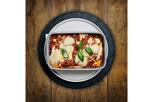 Beef Lasagna - authentic bolognese with bchamel sauce, mozzarella, basil, parmesan